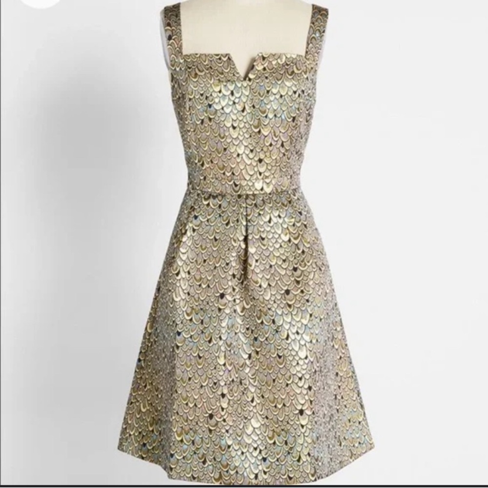 Mermaid or dragon scales? You decide! This dress is enchanting and whimsical.